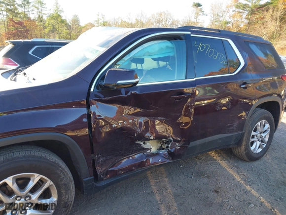2019 Chevrolet Traverse LT Cloth with VIN 1GNEVGKW0KJ103392, listed as a IAAI auction lot 40702731 with 77,025 mi miles. Bid and sale history available at carsss.com. Image 6.