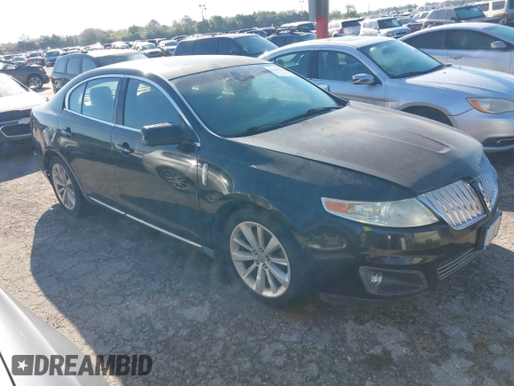 2009 Lincoln MKS with VIN 1LNHM94RX9G607947, listed as a IAAI auction lot 41644221 with 184,979 mi miles. Bid and sale history available at carsss.com. Image 1.