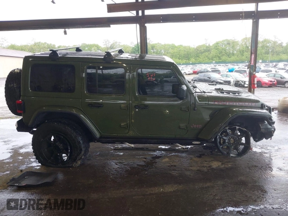 2021 Jeep Wrangler Unlimited Rubicon with VIN 1C4HJXFG4MW543254, listed as a IAAI auction lot 42316180 with 50,696 mi miles and . Bid and sale history available at DreamBid. Image 13.