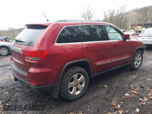 2012 Jeep Grand Cherokee Laredo with VIN 1C4RJFAG7CC123669, listed as a IAAI auction lot 42001472 with 164,806 mi miles. Bid and sale history available at carsss.com. Image 4.