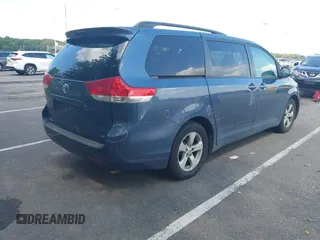2014 Toyota Sienna LE AAS with VIN 5TDKK3DC6ES458218, listed as a IAAI auction lot 42670342 with 79,213 mi miles and . Bid and sale history available at DreamBid. Image 4.