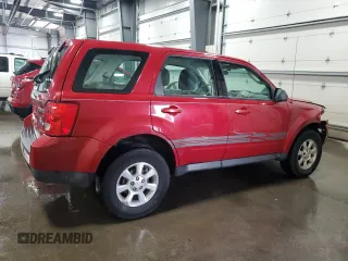 2011 Mazda Tribute Touring with VIN 4F2CY0C71BKM06780, listed as a Copart auction lot 77748114 with 144,163 mi miles and Salvage Title. Bid and sale history available at carsss.com. Image 3.
