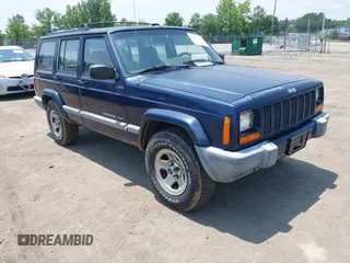 2001 Jeep Cherokee Sport z VIN 1J4FT48S01L603930, wystawiony jako IAAI lot #42503730 z przebiegiem 149 030 mil mil oraz . Historia ofert i sprzedaży dostępna na DreamBid. Obrazek 1.