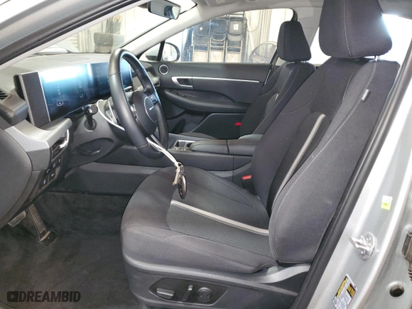 2024 Hyundai Sonata Hybrid SEL with VIN KMHL34JJ0RA099179, listed as a Copart auction lot 54046565 with 29,049 mi miles and Clean Title. Bid and sale history available at carsss.com. Image 7.