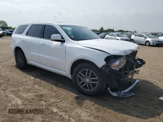 2016 Dodge Durango R/T with VIN 1C4SDJCTXGC411214, listed as a Copart auction lot 59897985 with Not provided miles and Salvage title. Bid and sale history available at DreamBid. Image 4.