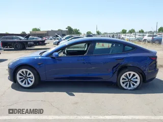 2023 Tesla Model 3 z VIN 5YJ3E1EA6PF547209, wystawiony jako IAAI lot #42511077 z przebiegiem 6 125 mil mil oraz . Historia ofert i sprzedaży dostępna na DreamBid. Obrazek 14.