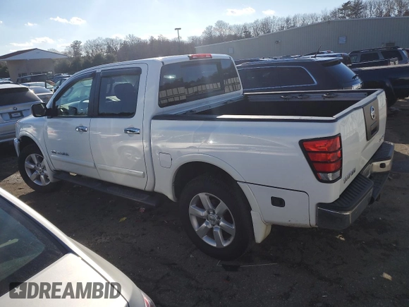 2011 Nissan Titan SL with VIN 1N6AA0EC7BN323825, listed as a Copart auction lot 46978315 with 143,228 mi miles and Salvage Title. Bid and sale history available at carsss.com. Image 2.