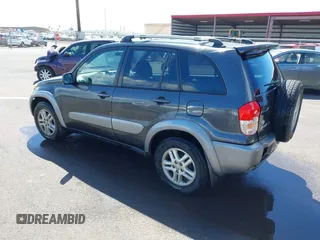 2003 Toyota RAV4 with VIN JTEGH20V130096493, listed as a IAAI auction lot 41743294 with 219,031 mi miles. Bid and sale history available at carsss.com. Image 3.