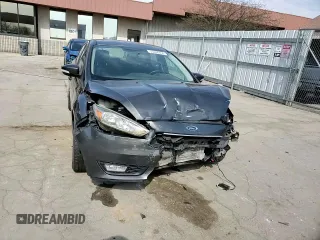 2015 Ford Focus SE z VIN 1FADP3F29FL340350, wystawiony jako Copart lot #53466455 z przebiegiem 146 374 mil mil oraz Szkoda całkowita • Salvage title. Historia ofert i sprzedaży dostępna na DreamBid. Obrazek 11.