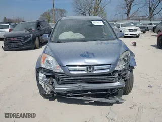 2009 Honda CR-V EX-L with VIN JHLRE48729C009573, listed as a IAAI auction lot 41798471 with 86,215 mi miles. Bid and sale history available at carsss.com. Image 13.