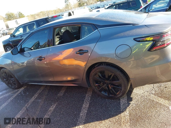 2020 Nissan Maxima S with VIN 1N4AA6BV7LC381254, listed as a IAAI auction lot 41246789 with 73,562 mi miles and . Bid and sale history available at DreamBid. Image 14.