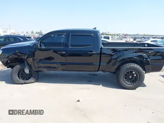 2014 Toyota Tacoma PreRunner with VIN 3TMKU4HN0EM040104, listed as a IAAI auction lot 41619179 with 171,542 mi miles and . Bid and sale history available at DreamBid. Image 14.
