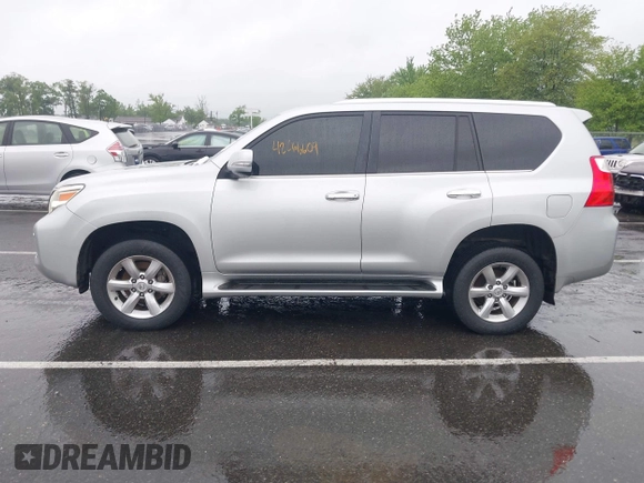 2011 Lexus GX 460 with VIN JTJBM7FX7B5029749, listed as a IAAI auction lot 42266609 with 141,525 mi miles and . Bid and sale history available at DreamBid. Image 14.