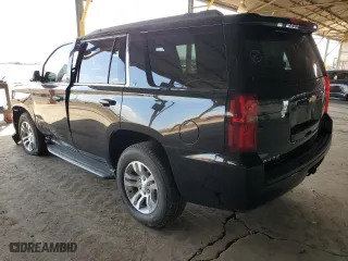 2019 Chevrolet Tahoe LT with VIN 1GNSKBKCXKR336038, listed as a Copart auction lot 50979795 with 81,359 mi miles and Salvage Title. Bid and sale history available at carsss.com. Image 2.