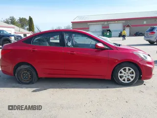 2014 Hyundai Accent GLS with VIN KMHCT4AE7EU675166, listed as a IAAI auction lot 41897417 with 164,738 mi miles and . Bid and sale history available at DreamBid. Image 14.