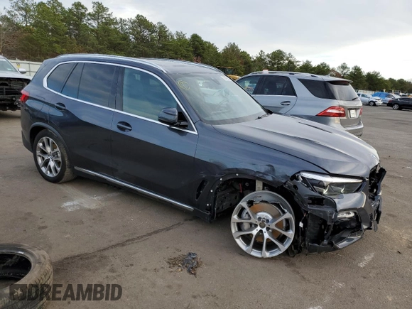 2020 BMW X5 xDrive40i with VIN 5UXCR6C0XLLL75042, listed as a Copart auction lot 70442352 with 31,604 mi miles. Bid and sale history available at carsss.com. Image 4.