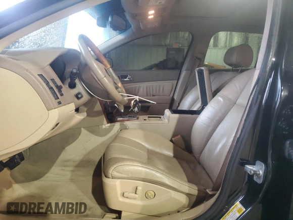 2006 Cadillac STS with VIN 1G6DC67A260208841, listed as a Copart auction lot 43142645 with 165,684 mi miles and Salvage Title. Bid and sale history available at DreamBid. Image 7.