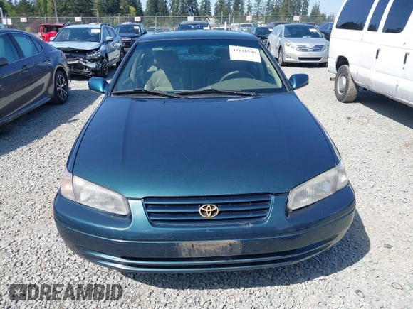 1998 Toyota Camry LE z VIN JT2BF28K4W0101312, wystawiony jako IAAI lot #42116546 z przebiegiem 365 712 mil mil oraz . Historia ofert i sprzedaży dostępna na DreamBid. Obrazek 12.