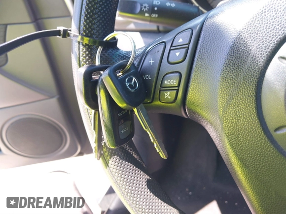 2008 Mazda 3 i Sport with VIN JM1BK32F881775903, listed as a IAAI auction lot 41878314 with 128,232 mi miles and . Bid and sale history available at DreamBid. Image 11.
