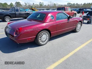 2004 Ford Thunderbird Deluxe with VIN 1FAHP60A64Y105598, listed as a IAAI auction lot 41806334 with 18,583 mi miles and . Bid and sale history available at DreamBid. Image 4.