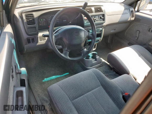 1999 Nissan Frontier XE with VIN 1N6DD26S9XC307893, listed as a Copart auction lot 66045605 with 239,269 mi miles and Salvage title. Bid and sale history available at DreamBid. Image 8.