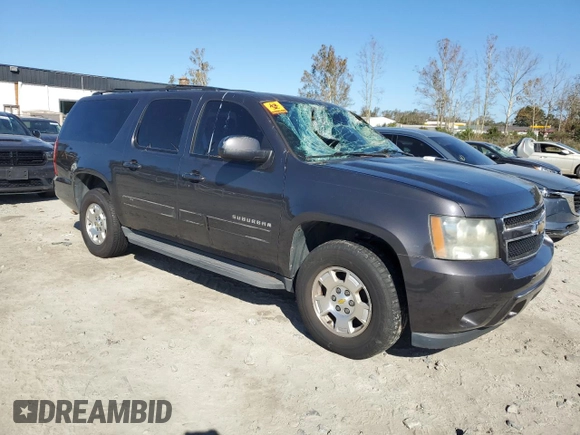 2011 Chevrolet Suburban LS with VIN 1GNSCHE0XBR294973, listed as a Copart auction lot 77258024 with 193,139 mi miles and Salvage Title. Bid and sale history available at carsss.com. Image 4.