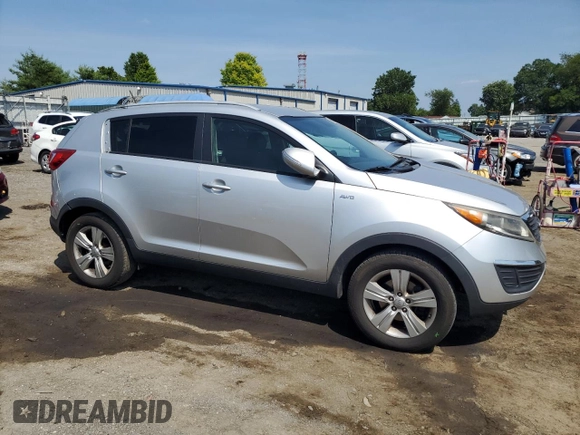 2013 Kia Sportage LX with VIN KNDPBCA24D7521374, listed as a Copart auction lot 61654725 with 146,378 mi miles and Salvage title. Bid and sale history available at DreamBid. Image 4.
