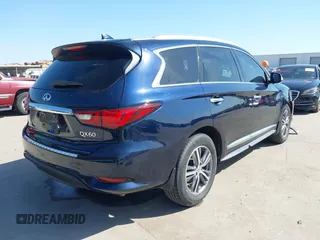 2020 Infiniti QX60 Pure with VIN 5N1DL0MN1LC506501, listed as a IAAI auction lot 41968177 with 53,128 mi miles and . Bid and sale history available at DreamBid. Image 4.