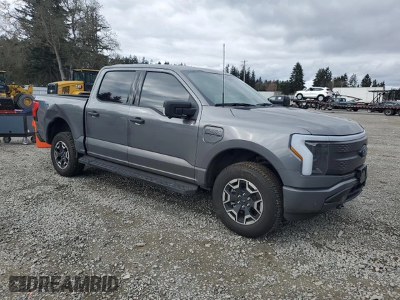 2023 Ford F-150 Lightning Pro with VIN 1FTVW1EL8PWG38419, listed as a Copart auction lot 47630535 with 11,940 mi miles and Salvage Title. Bid and sale history available at DreamBid. Image 4.
