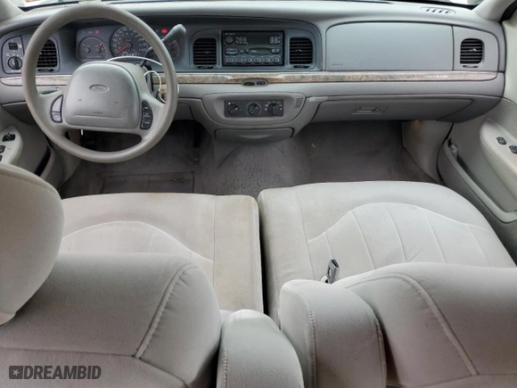 2000 Ford Crown Victoria with VIN 2FAFP73W6YX117101, listed as a Copart auction lot 66004304 with 124,011 mi miles and Clean Title. Bid and sale history available at carsss.com. Image 8.
