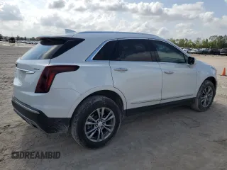 2021 Cadillac XT5 FWD Premium Luxury z VIN 1GYKNCR48MZ136597, wystawiony jako Copart lot #79694104 z przebiegiem 52 504 mil mil oraz Szkoda całkowita • Salvage title. Historia ofert i sprzedaży dostępna na DreamBid. Obrazek 3.