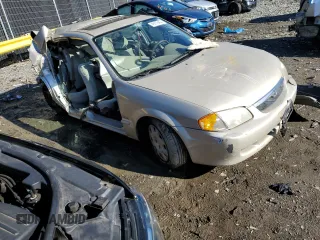 2000 Mazda Protege DX z VIN JM1BJ2220Y0197585, wystawiony jako Copart lot #65309404 z przebiegiem Nie podano mil oraz Nie do naprawy • Non repairable. Historia ofert i sprzedaży dostępna na DreamBid. Obrazek 4.