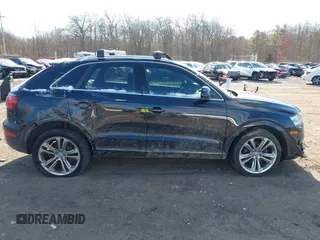 2015 Audi Q3 Prestige with VIN WA1GFCFS4FR004025, listed as a IAAI auction lot 41286031 with 103,132 mi miles and . Bid and sale history available at DreamBid. Image 13.