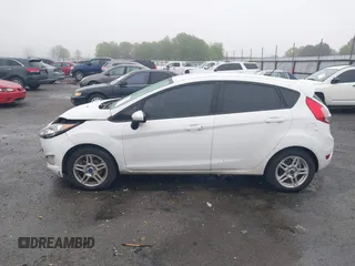 2019 Ford Fiesta SE with VIN 3FADP4EJ1KM111572, listed as a IAAI auction lot 41936091 with 162,020 mi miles and . Bid and sale history available at carsss.com. Image 14.
