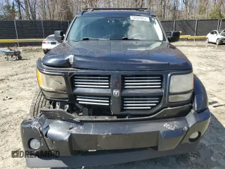 2011 Dodge Nitro Heat z VIN 1D4PU4GK7BW605931, wystawiony jako Copart lot #50860885 z przebiegiem 149 697 mil mil oraz Szkoda całkowita • Salvage title. Historia ofert i sprzedaży dostępna na DreamBid. Obrazek 5.