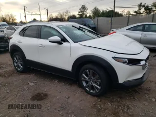 2024 Mazda CX-30 S Premium with VIN 3MVDMBDM3RM614029, listed as a Copart auction lot 81659794 with 562 mi miles and Salvage Title. Bid and sale history available at DreamBid. Image 4.