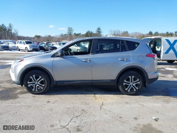 2018 Toyota RAV4 LE with VIN 2T3BFREV7JW728587, listed as a IAAI auction lot 41312419 with 103,134 mi miles. Bid and sale history available at carsss.com. Image 14.