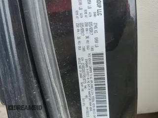 2015 Dodge Grand Caravan SE with VIN 2C4RDGBG7FR516773, listed as a Copart auction lot 52035135 with 132,122 mi miles and Salvage Title. Bid and sale history available at DreamBid. Image 13.