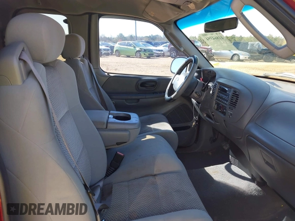 2003 Ford F-150 XL with VIN 1FTRX17W43NA07186, listed as a IAAI auction lot 41864354 with 123,565 mi miles. Bid and sale history available at carsss.com. Image 5.