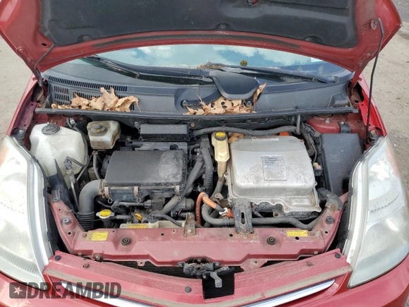 2007 Toyota Prius z VIN JTDKB20U673208958, wystawiony jako Copart lot #50962815 z przebiegiem Nie podano mil oraz Czysty tytuł • Clean title. Historia ofert i sprzedaży dostępna na DreamBid. Obrazek 11.