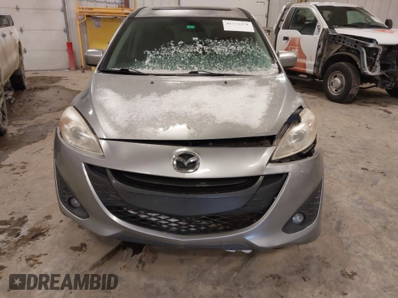 2012 Mazda 5 Touring z VIN JM1CW2CL1C0107706, wystawiony jako IAAI lot #41551479 z przebiegiem 123 418 mil mil oraz . Historia ofert i sprzedaży dostępna na DreamBid. Obrazek 6.