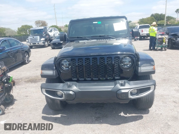 2022 Jeep Gladiator Willys Sport z VIN 1C6HJTAG7NL161701, wystawiony jako IAAI lot #42097144 z przebiegiem 32 989 mil mil oraz . Historia ofert i sprzedaży dostępna na DreamBid. Obrazek 6.