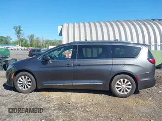 2018 Chrysler Pacifica Touring L with VIN 2C4RC1BG1JR112084, listed as a IAAI auction lot 42206441 with 163,952 mi miles and . Bid and sale history available at DreamBid. Image 14.