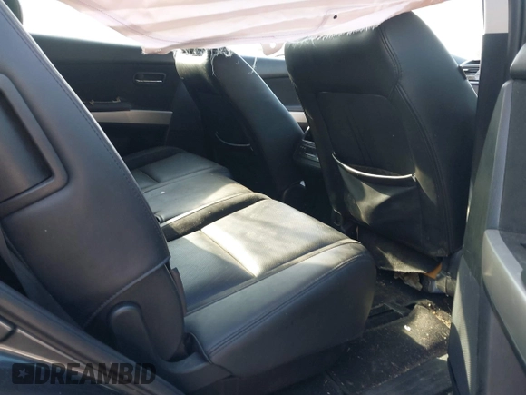 2013 Mazda CX-9 Grand Touring z VIN JM3TB2DA6D0424124, wystawiony jako IAAI lot #42032588 z przebiegiem 151 569 mil mil oraz . Historia ofert i sprzedaży dostępna na DreamBid. Obrazek 8.