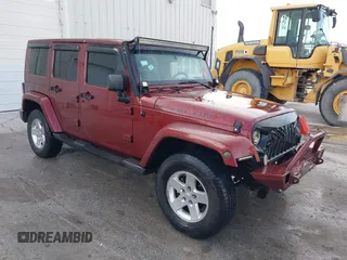 2007 Jeep Wrangler Unlimited Sahara z VIN 1J4GA59127L187281, wystawiony jako IAAI lot #41760783 z przebiegiem 280 772 mil mil oraz . Historia ofert i sprzedaży dostępna na DreamBid. Obrazek 1.
