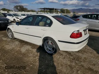 2004 BMW 3 Series 325i with VIN WBAAZ33454KP84385, listed as a Copart auction lot 41879615 with 140,811 mi miles and Salvage Title. Bid and sale history available at carsss.com. Image 2.