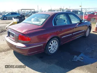 2002 Hyundai Sonata GLS with VIN KMHWF35HX2A586689, listed as a IAAI auction lot 41681385 with 273,132 mi miles. Bid and sale history available at carsss.com. Image 4.