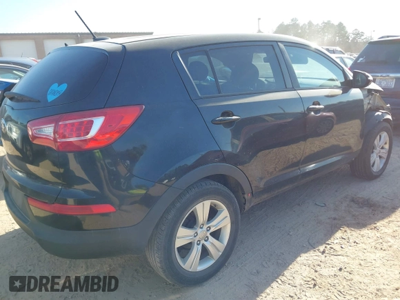 2013 Kia Sportage LX with VIN KNDPB3A21D7447783, listed as a IAAI auction lot 41656090 with 193,795 mi miles. Bid and sale history available at carsss.com. Image 4.