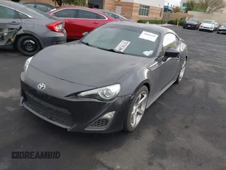 2014 Scion FR-S z VIN JF1ZNAA1XE8707577, wystawiony jako IAAI lot #42054339 z przebiegiem 95 241 mil mil oraz . Historia ofert i sprzedaży dostępna na DreamBid. Obrazek 2.