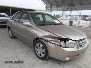 2004 Kia Spectra LX with VIN KNAFE121245064294, listed as a IAAI auction lot 41424241 with 110,136 mi miles. Bid and sale history available at carsss.com. Image 1.